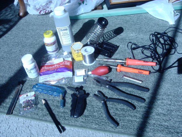 Or my complete collection of stained glass tools and supplies? Dining Table